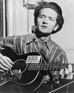 477px-Woody_Guthrie_NYWTS-238x300