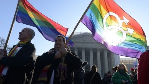 photo credit Rainbow flags outside the Supreme Court in 2013. Image: EPA/MICHAEL REYNOLDS
